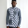 An Intersected Checkerboard & Windowpane Check Layered Casual Shirt.