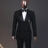 An Inverted “Pirate”, knitted, charcoal black with distributed square pattern jacquard peak lapel, 9 button tuxedo suit.