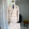 An Irish Cream double breasted peak lapel suit