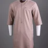An Irish cream, zip line with dispersed arewa embroidery, 3/4 sleeve African senator Kaftan native.