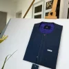 An Irish dark grey kaftan with clear view pearl matching Swarovski button