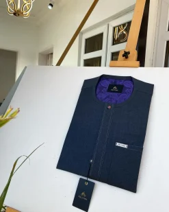 An Irish dark grey kaftan with clear view pearl matching Swarovski button