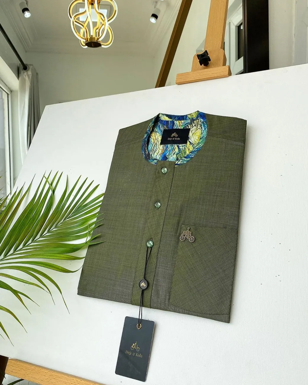 An Irish Green African kaftan with mixed shade of green paisley detailing