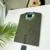 An Irish Green with a clear view of Swarovski stone buttons African kaftan and Sokoto