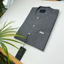 An Irish Grey African Kaftan with ABV diamond-shaped Australian Swarovski button