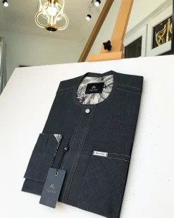 An Irish Grey Kaftan with a clear view of Swarovski button detailing