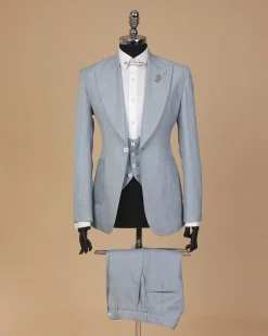 An Irish Maya blue, knitted peak lapel, patch pocket suit
