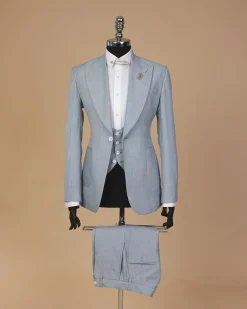 An Irish Maya blue, knitted peak lapel, patch pocket suit