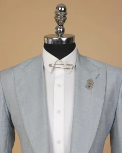 An Irish Maya blue, knitted peak lapel, patch pocket suit