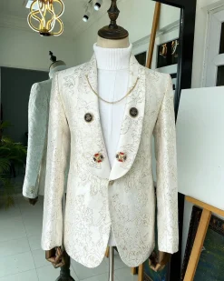 An Ivory Gold Patterned “From The Same Side” Shawl lapel Suit.