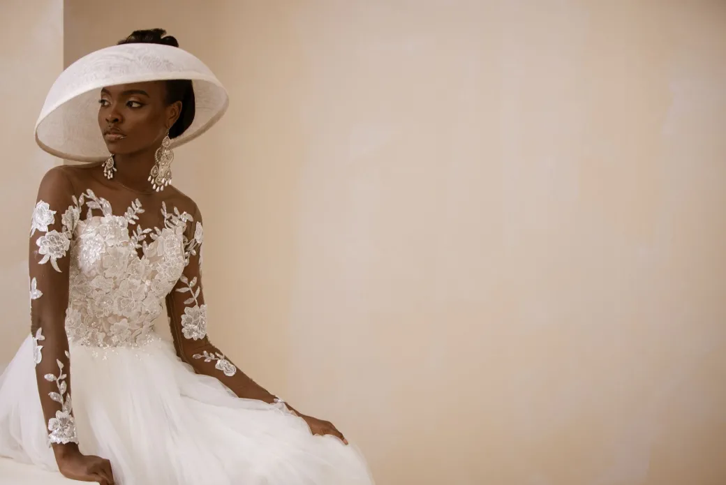 An Ivory Top Patterned Long Sleeve Tulle Wedding gown/dress