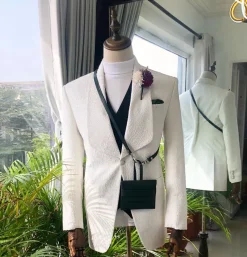 An Ivory White “Wedding In The Jungle” shawl lapel tuxedo suit