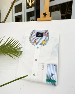 An Ivory white African kaftan, paisley detailing, Swarovski buttons