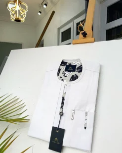An Ivory white African Kaftan with paisley detailing and sokoto