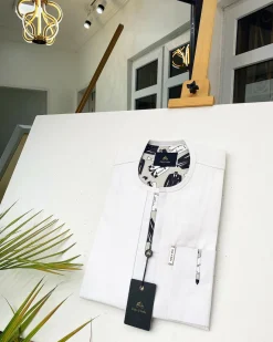 An Ivory white African Kaftan with paisley detailing and sokoto