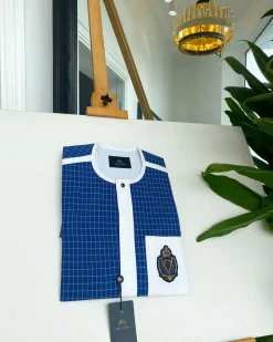 An Ivory white and blue check, black Swarovski buttons, front flap, Indian Hand embroidery badge details African traditional senator kaftan native.