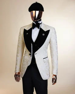 An Ivory white and Gold Floral patterned Peak lapel metallic jacquard tuxedo suit.
