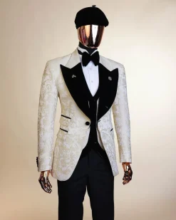 An Ivory white and Gold Floral patterned Peak lapel metallic jacquard tuxedo suit.