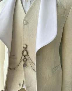 An Ivory White “Celestial” shawl lapel tuxedo tailored suit