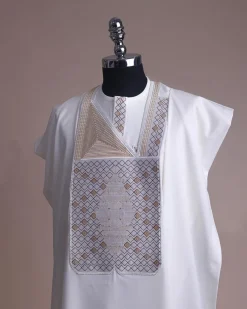An Ivory white, chinoiserie chic pagoda with layers metallic wire embroidery details agbada