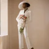 An Ivory White Cross Tuxedo Bridal Suit