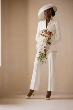 An Ivory White Cross Tuxedo Bridal Suit