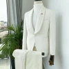 An Ivory White dispersed unequal pattern shawl lapel jacquard texedo suit.