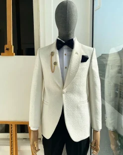 An Ivory white dispersed floral pattern jacquard shawl lapel blazer suit
