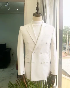 An Ivory White Double Breasted Peak Lapel Suit