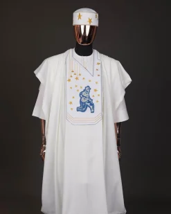 An Ivory white, dropping stars and bender knees metallic wire embroidery details agbada