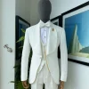 An ivory white, elastic, basket weave layered floral jacquard shawl lapel tuxedo suit.