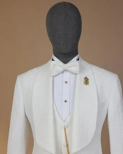 An ivory white, elastic, basket weave layered floral jacquard shawl lapel tuxedo suit.