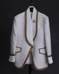An ivory white floral Jacquard, gold trimmings, patch pocket shawl lapel tuxedo suit
