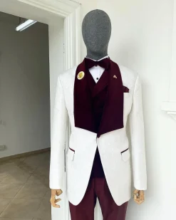 An Ivory white floral pattern jacquard shawl lapel tuxedo suit