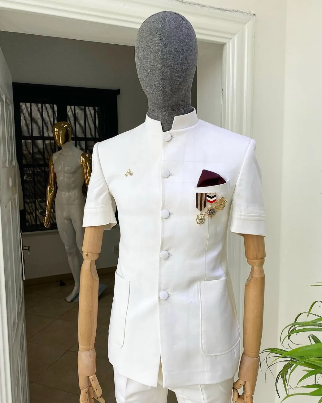An Ivory White “French” Safari Suit.