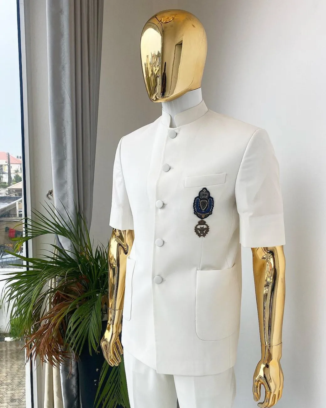 An Ivory White “French” Safari Suit