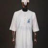 An Ivory white, front flap with dropping star embroidery , 3/4 sleeve African senator kaftan native.