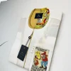 An Ivory white front flap with a clear view Swarovski crystal button, short-sleeve African kaftan