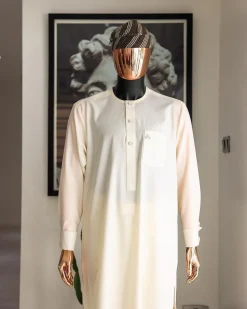 An Ivory white front flap with silver Swarovski button details, long-sleeve African senator kaftan native