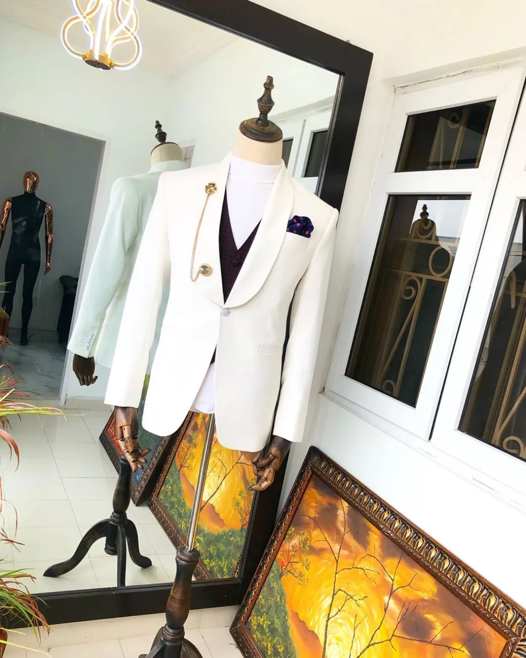 An Ivory “White Ivorian” Shawl Lapel tuxedo Suit