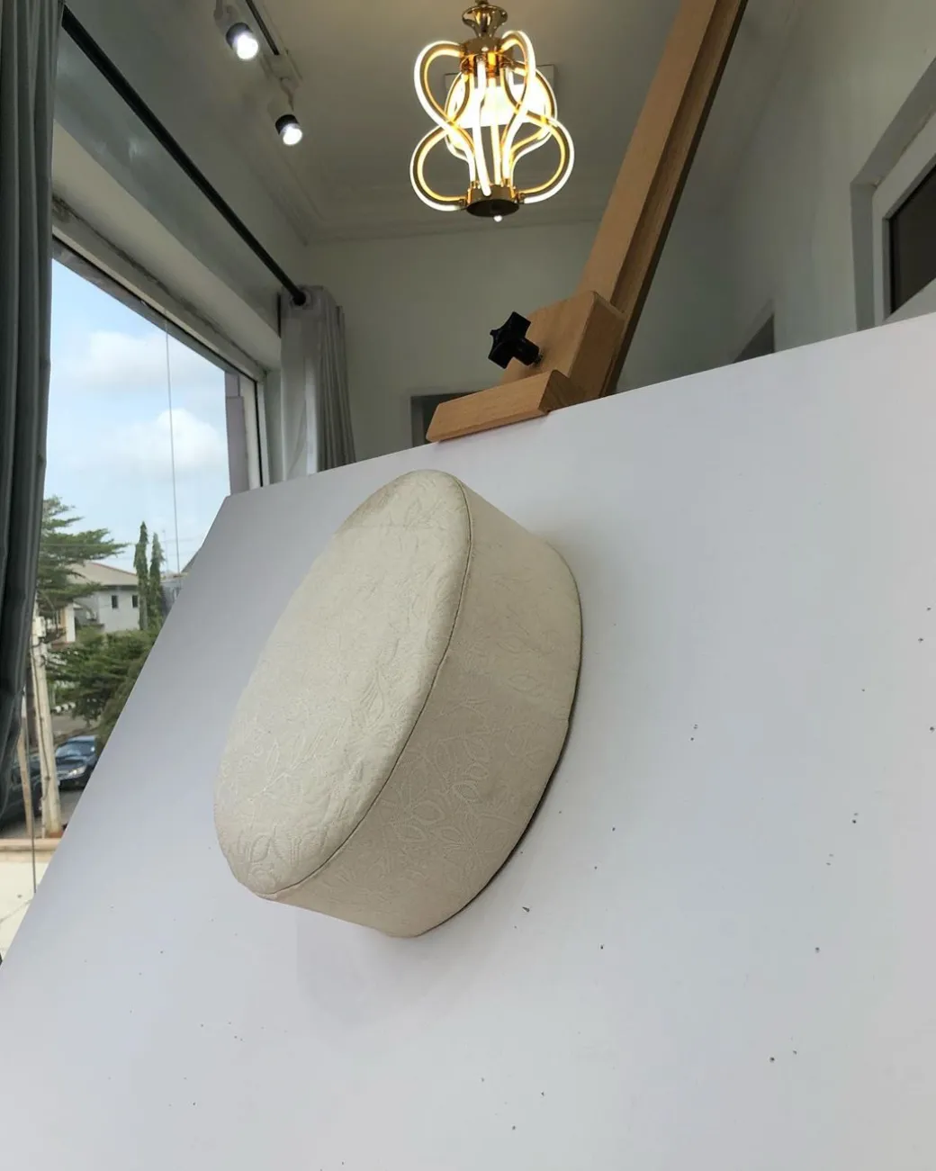 An Ivory White jacquard African Traditional Hat
