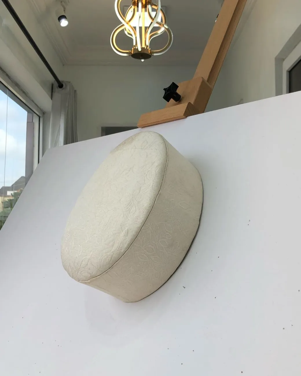 An Ivory White jacquard African Traditional Hat