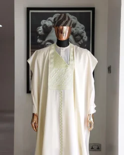 An Ivory White, Jakan And Lines Embroidery Details Agbada, 3/4 Sleeve Kaftan, And Sokoto