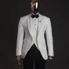 An ivory white, knitted, root floral jacquard notch tuxedo lapel suit