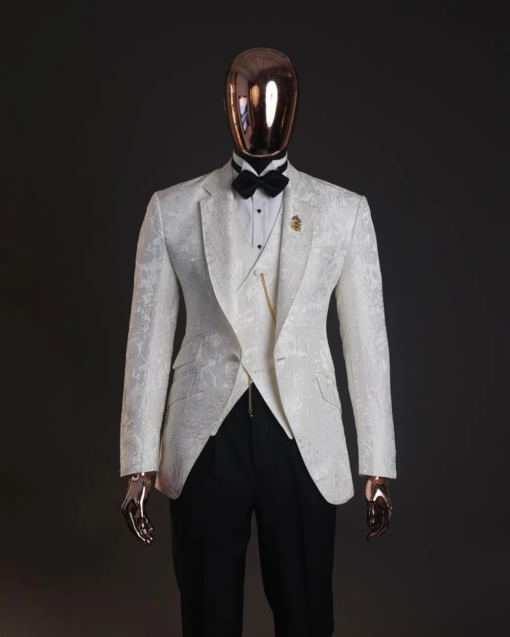 An ivory white, knitted, root floral jacquard notch tuxedo lapel suit