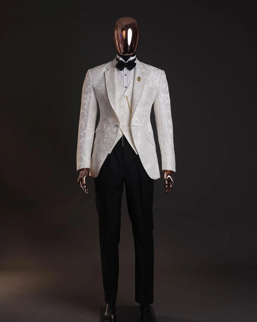 An ivory white, knitted, root floral jacquard notch tuxedo lapel suit