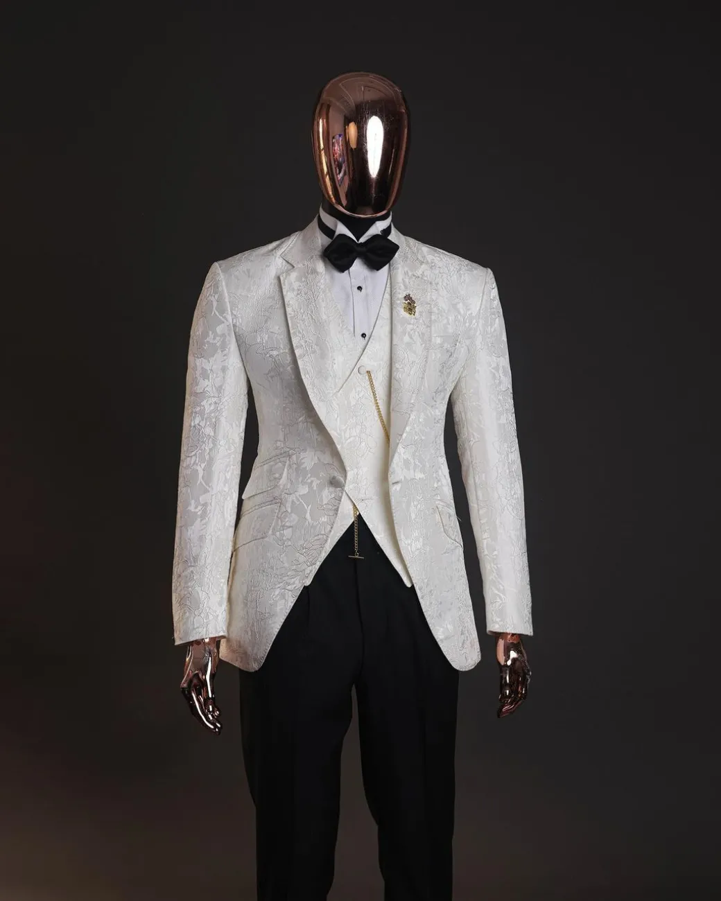 An ivory white, knitted, root floral jacquard notch tuxedo lapel suit