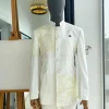 An Ivory White, Long Sleeve Safari Suit