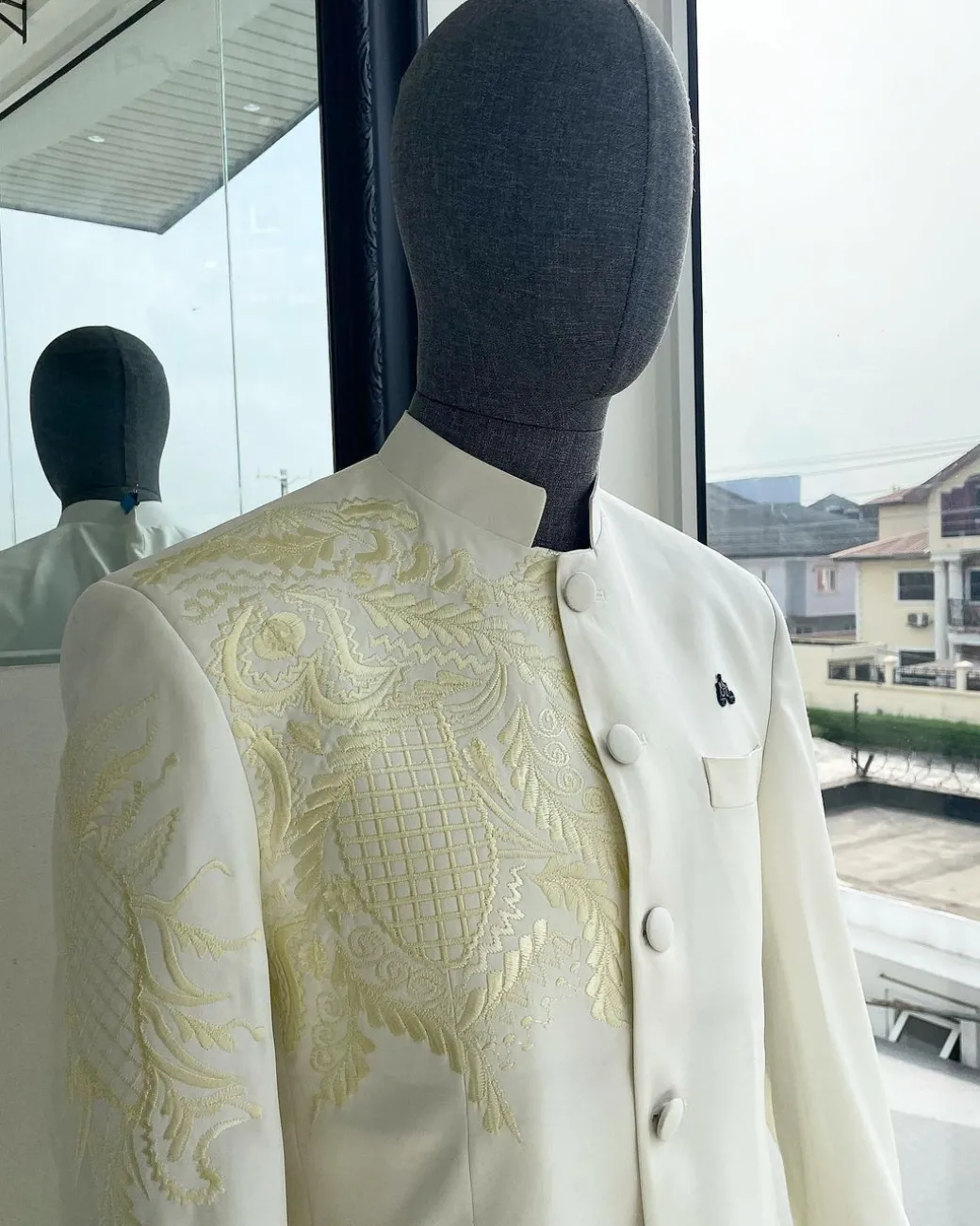 An Ivory White, Long Sleeve Safari Suit