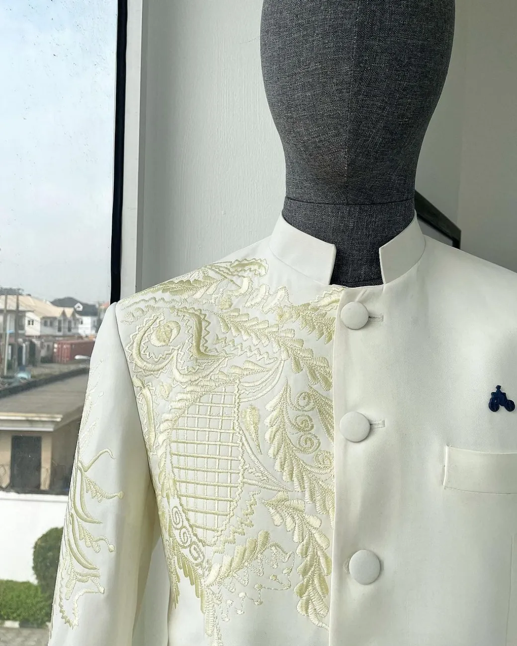 An Ivory White, Long Sleeve Safari Suit